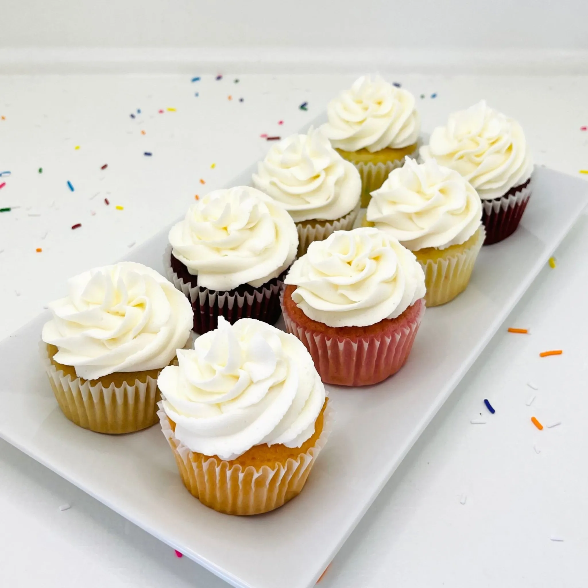 Custom decorated cupcakes by Sweet Escape Cake Company