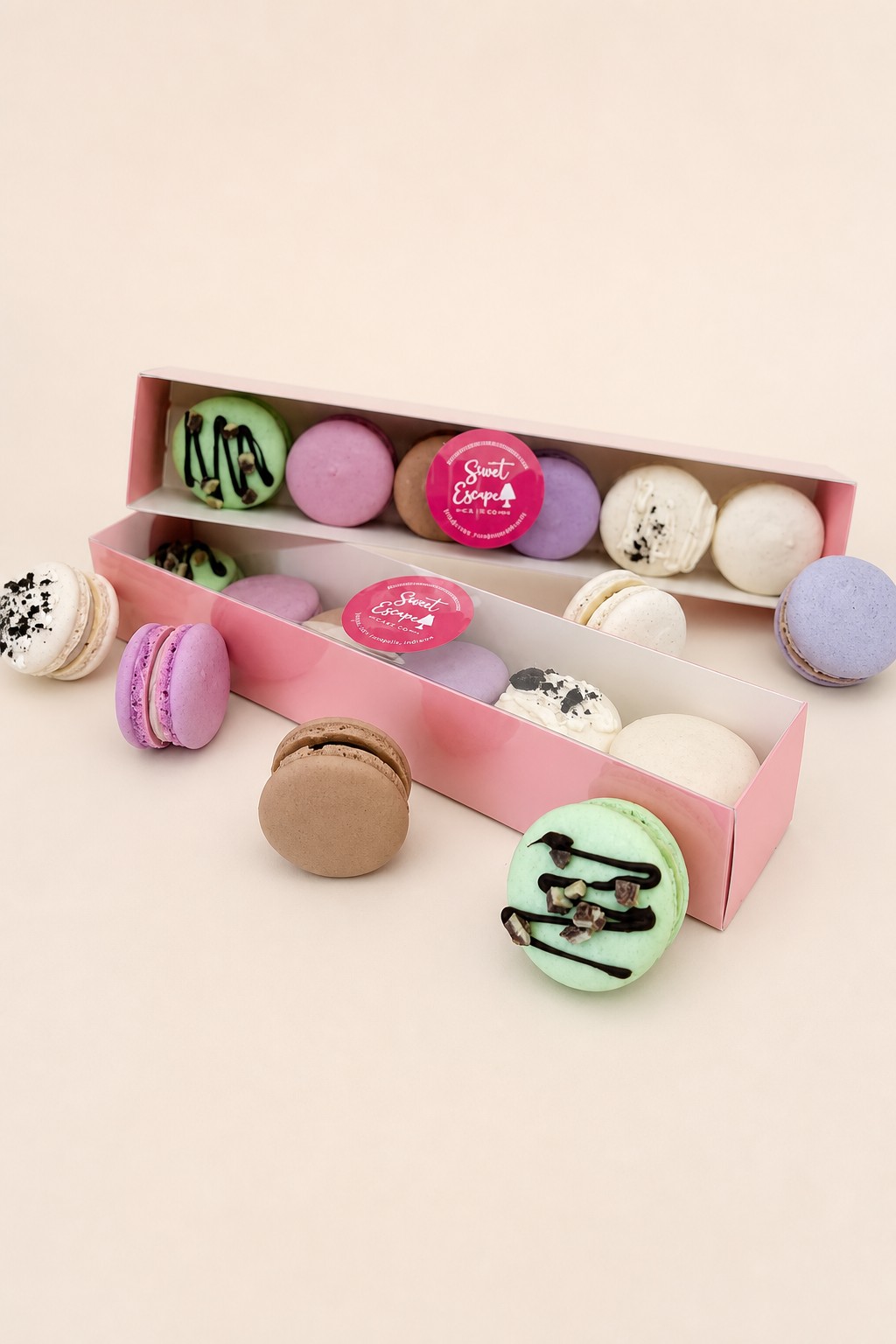 A vibrant assortment of pastel-colored macarons, some featuring chocolate drizzles and various toppings like cookie crumbs, presented in two