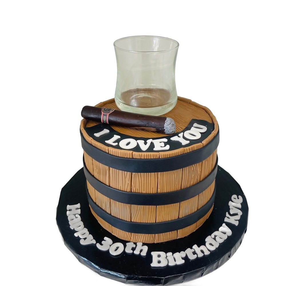 Sculpted 3D whiskey barrel specialty cake